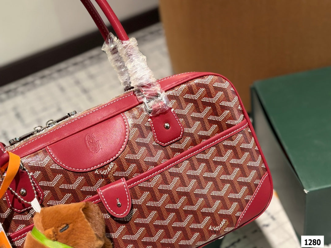 SAC SAINT MARTIN 35 EN TOILE GOYARDINE ROUGE BORDEAUX ET CUIR DE VEAU