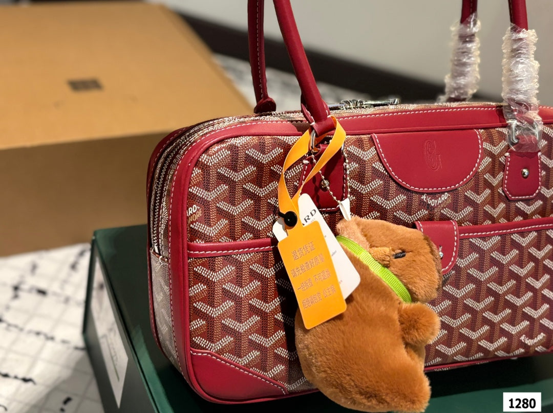 SAC SAINT MARTIN 35 EN TOILE GOYARDINE ROUGE BORDEAUX ET CUIR DE VEAU