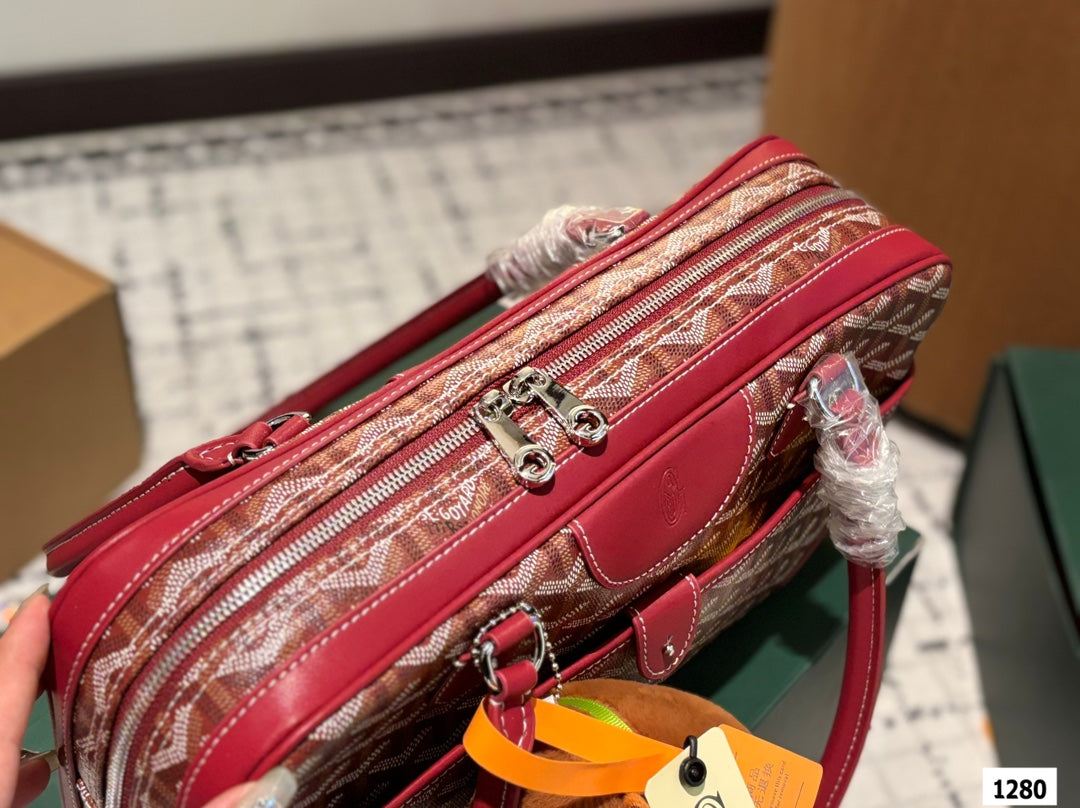 SAC SAINT MARTIN 35 EN TOILE GOYARDINE ROUGE BORDEAUX ET CUIR DE VEAU