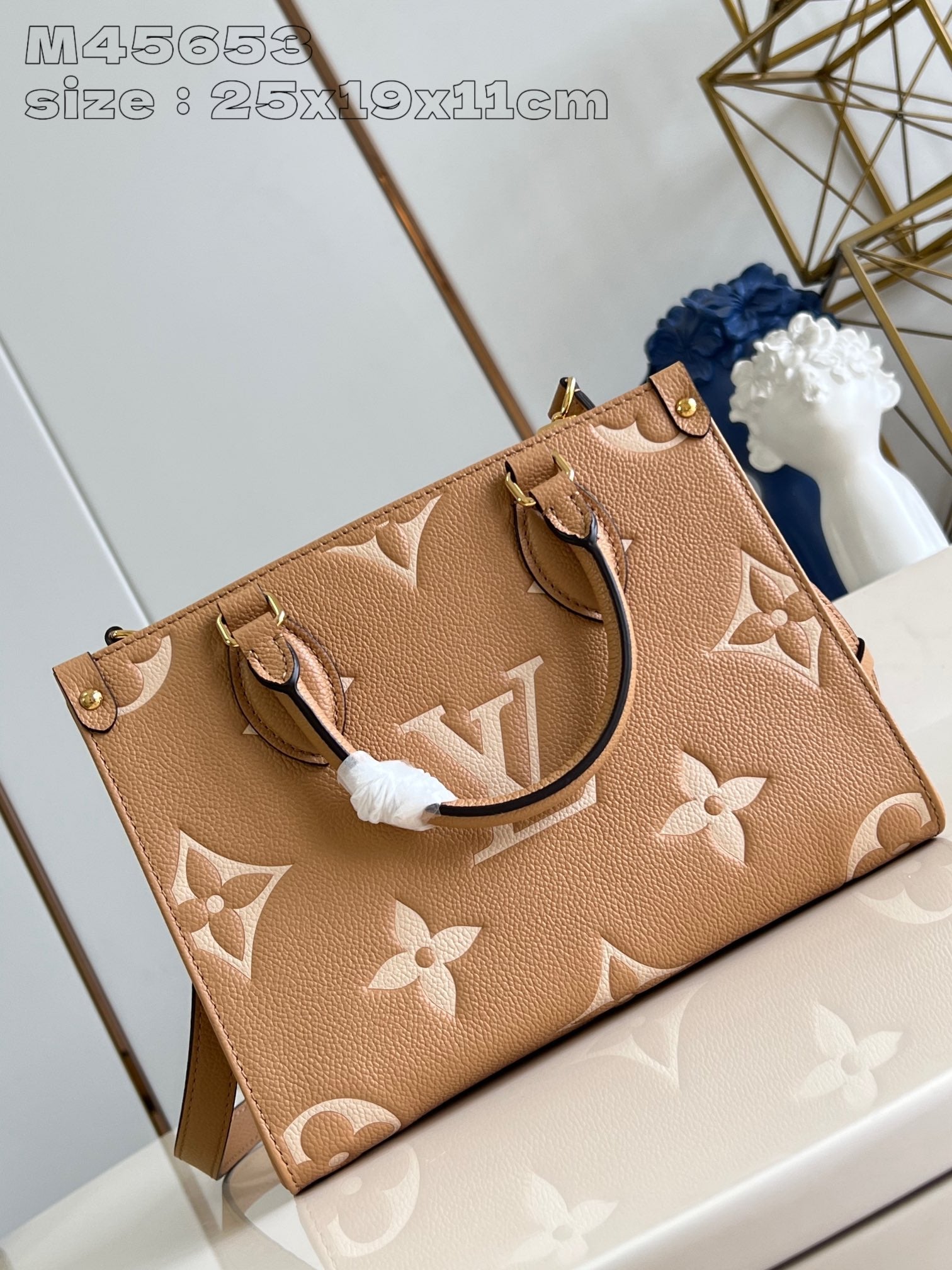 ONTHEGO PM 25 CUIR DE VEAU EMPREINTE MONOGRAMME BEIGE MARRON