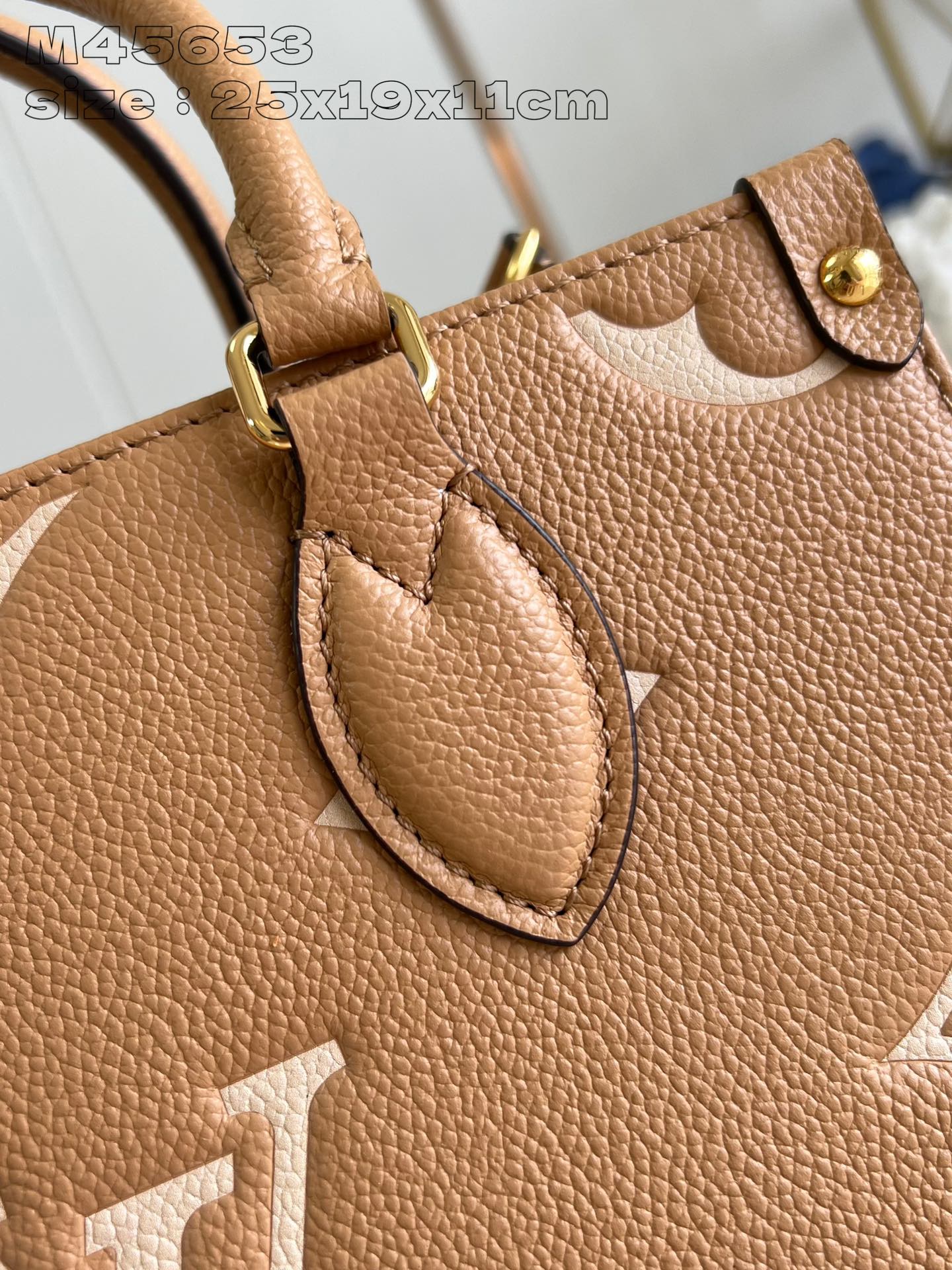 ONTHEGO PM 25 CUIR DE VEAU EMPREINTE MONOGRAMME BEIGE MARRON