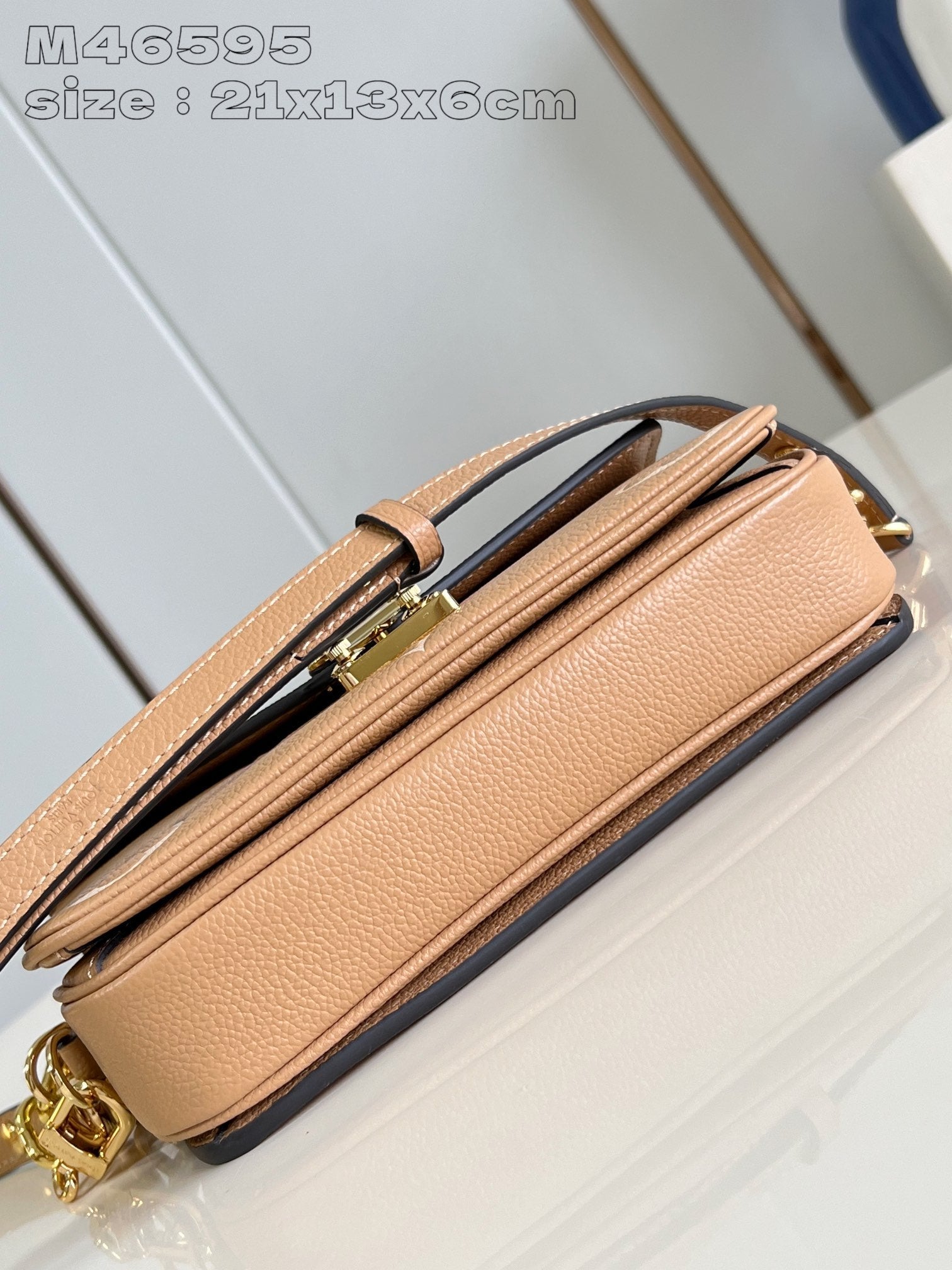 POCHETTE METIS EAST WEST 21.5 MARRON BLANC MONOGRAMME EMPREINTE CUIR DE VEAU