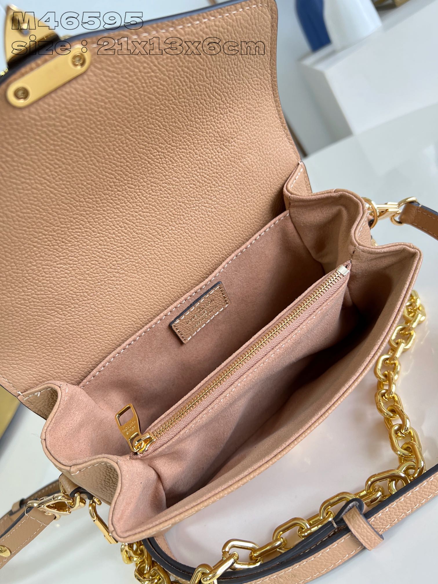 POCHETTE METIS EAST WEST 21.5 MARRON BLANC MONOGRAMME EMPREINTE CUIR DE VEAU
