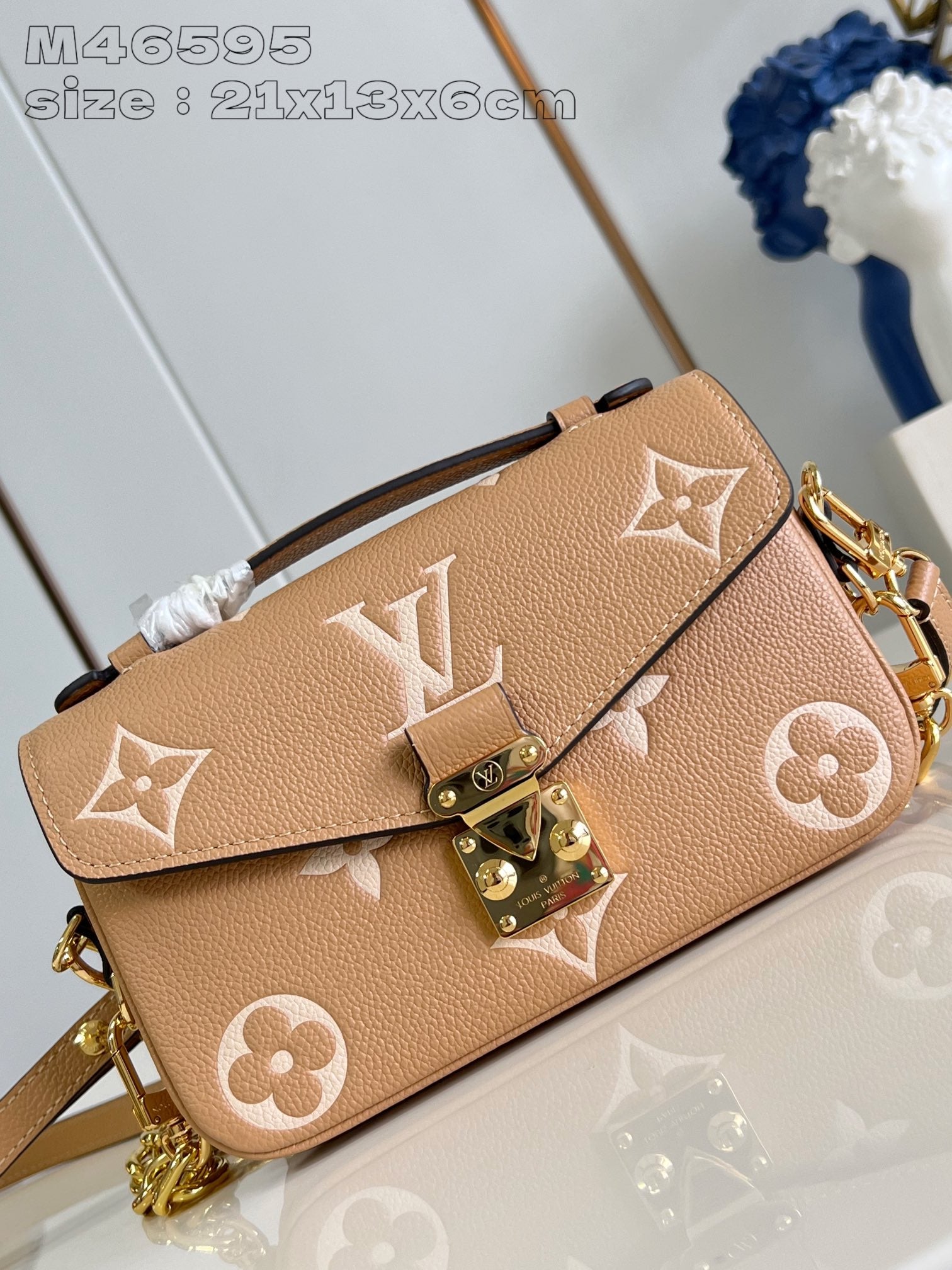 POCHETTE METIS EAST WEST 21.5 MARRON BLANC MONOGRAMME EMPREINTE CUIR DE VEAU