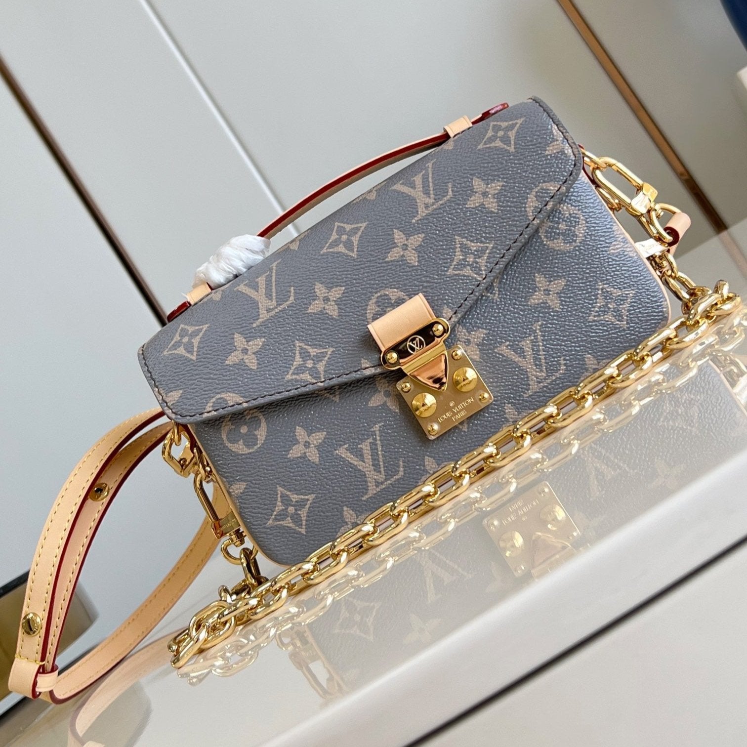 POCHETTE METIS EAST WEST 21,5 TOILE MONOGRAMME GRISE
