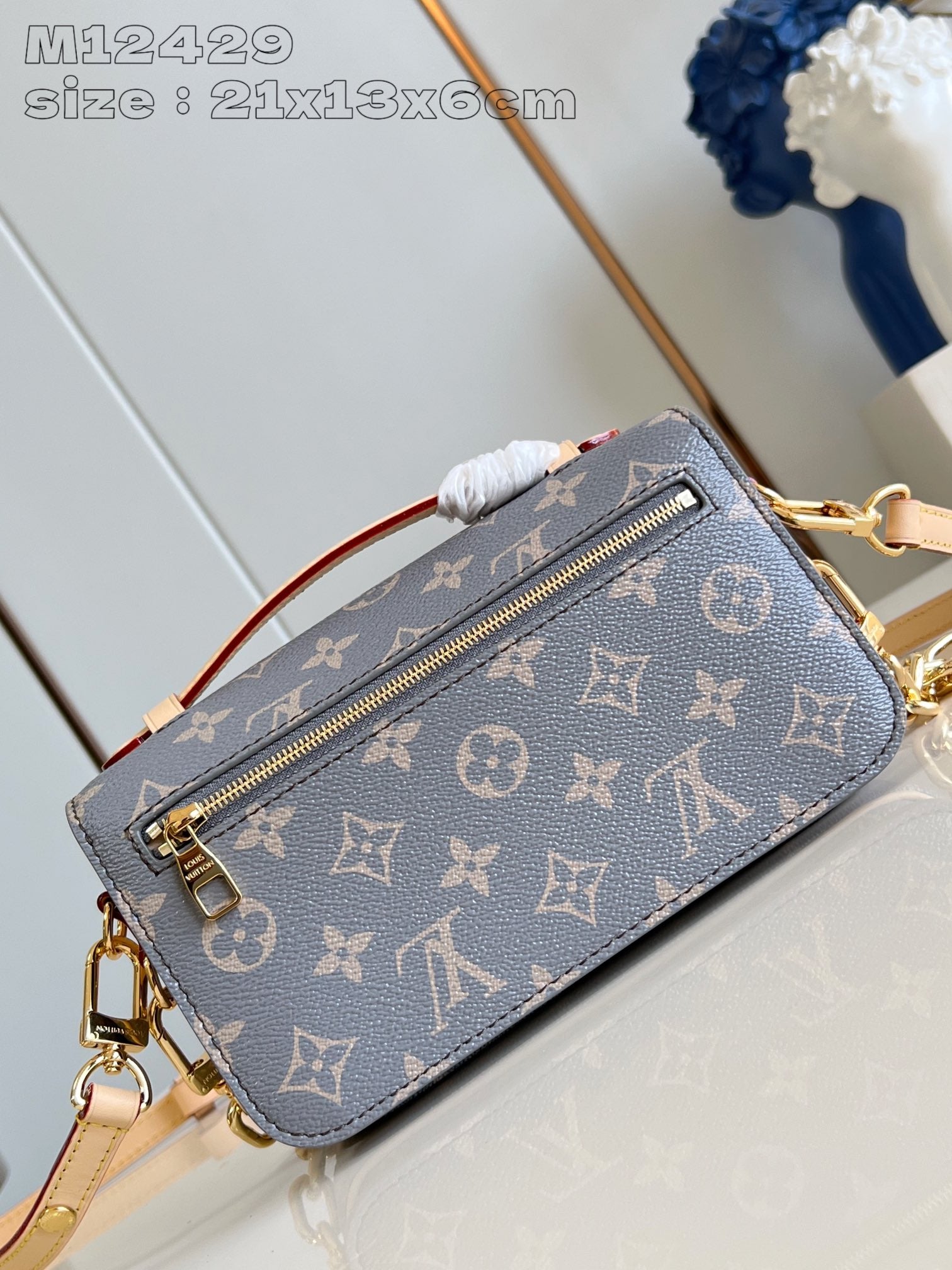 POCHETTE METIS EAST WEST 21,5 TOILE MONOGRAMME GRISE