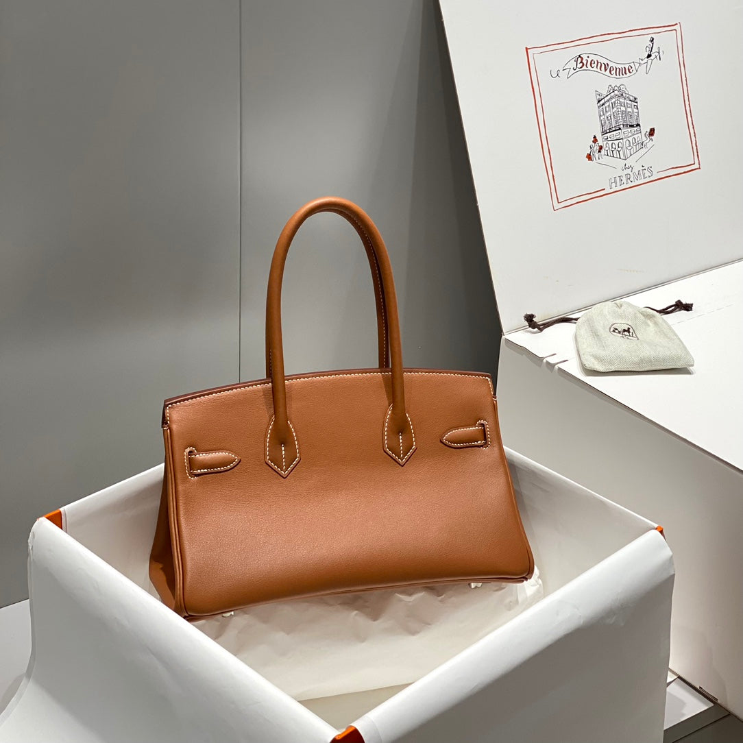 SAC À BANDOULIÈRE HM BIRKIN 29 CM EN CUIR SWIFT DORÉ ET QUINCAILLERIE ARGENTÉE
