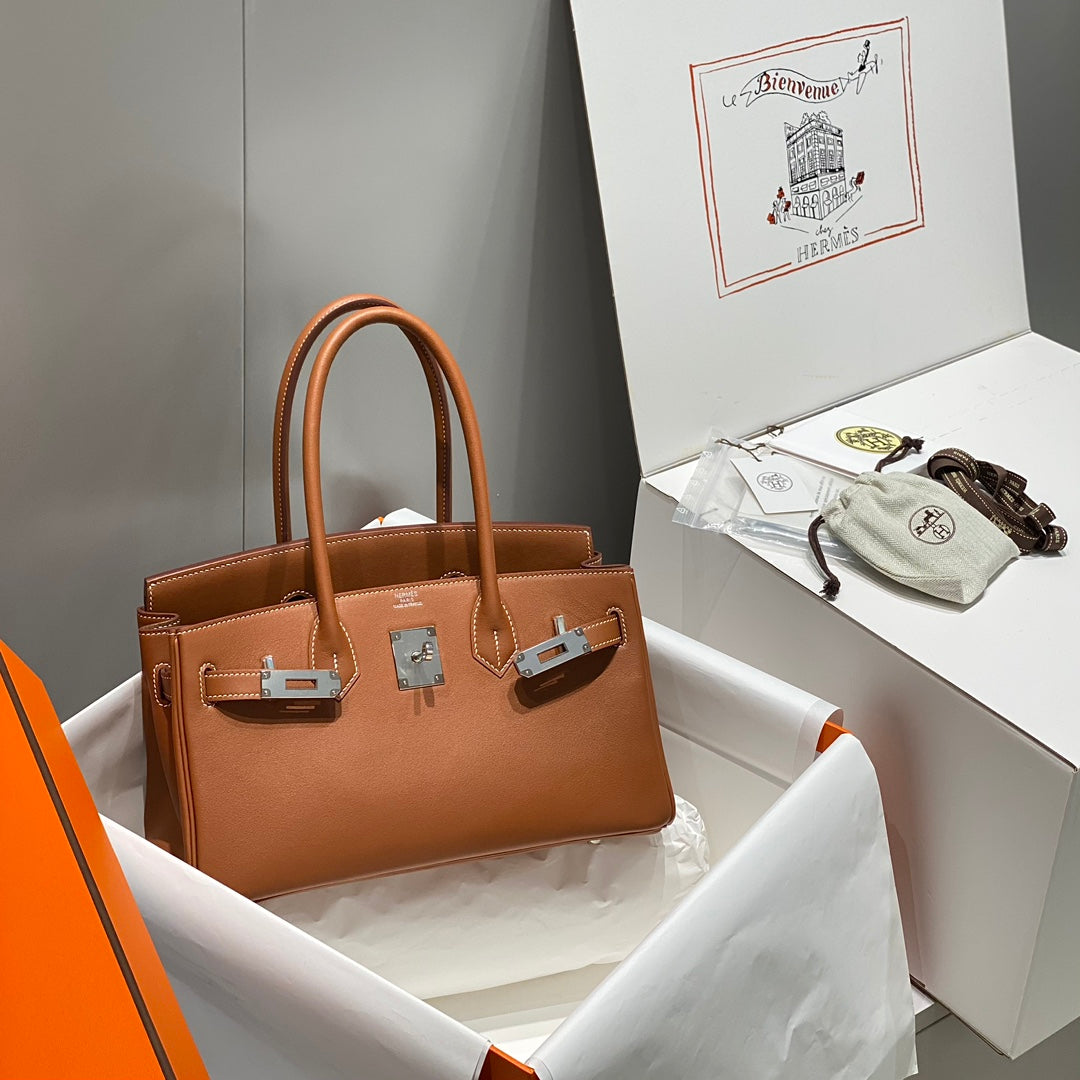 SAC À BANDOULIÈRE HM BIRKIN 29 CM EN CUIR SWIFT DORÉ ET QUINCAILLERIE ARGENTÉE
