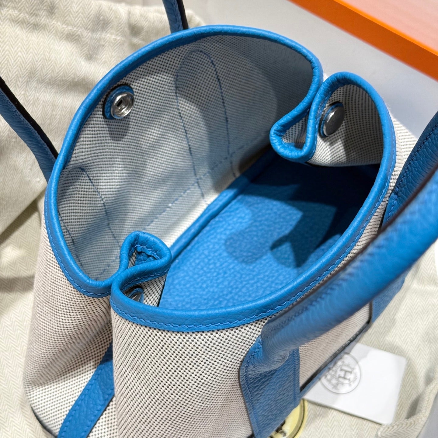 HM NEO GARDEN 23 BAG DODGER BLUE CANVAS AND NEGONDA CALFSKIN 243334