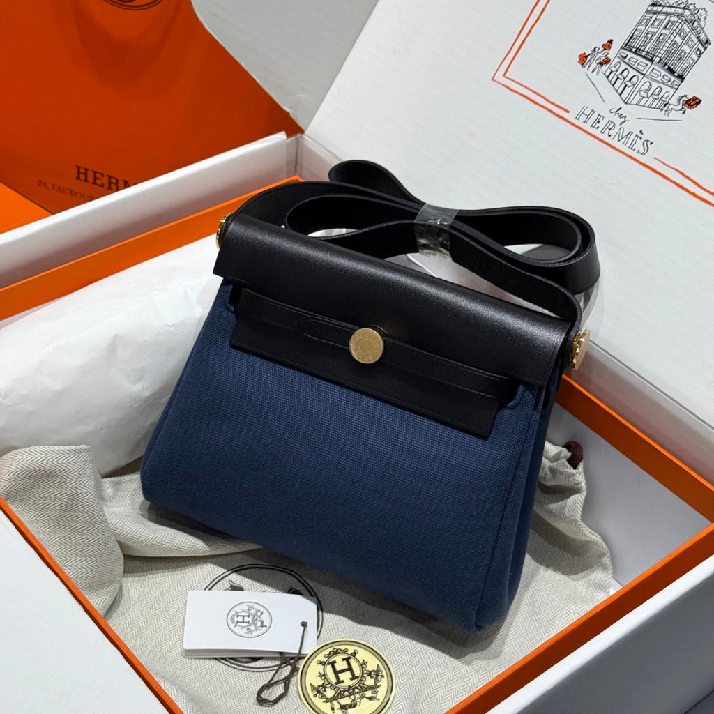 HM MINI HERBAG BOUCLE DORÉE 20 TOILE BLEU MARINE ET CUIR DE VACHE HUNTER 243255