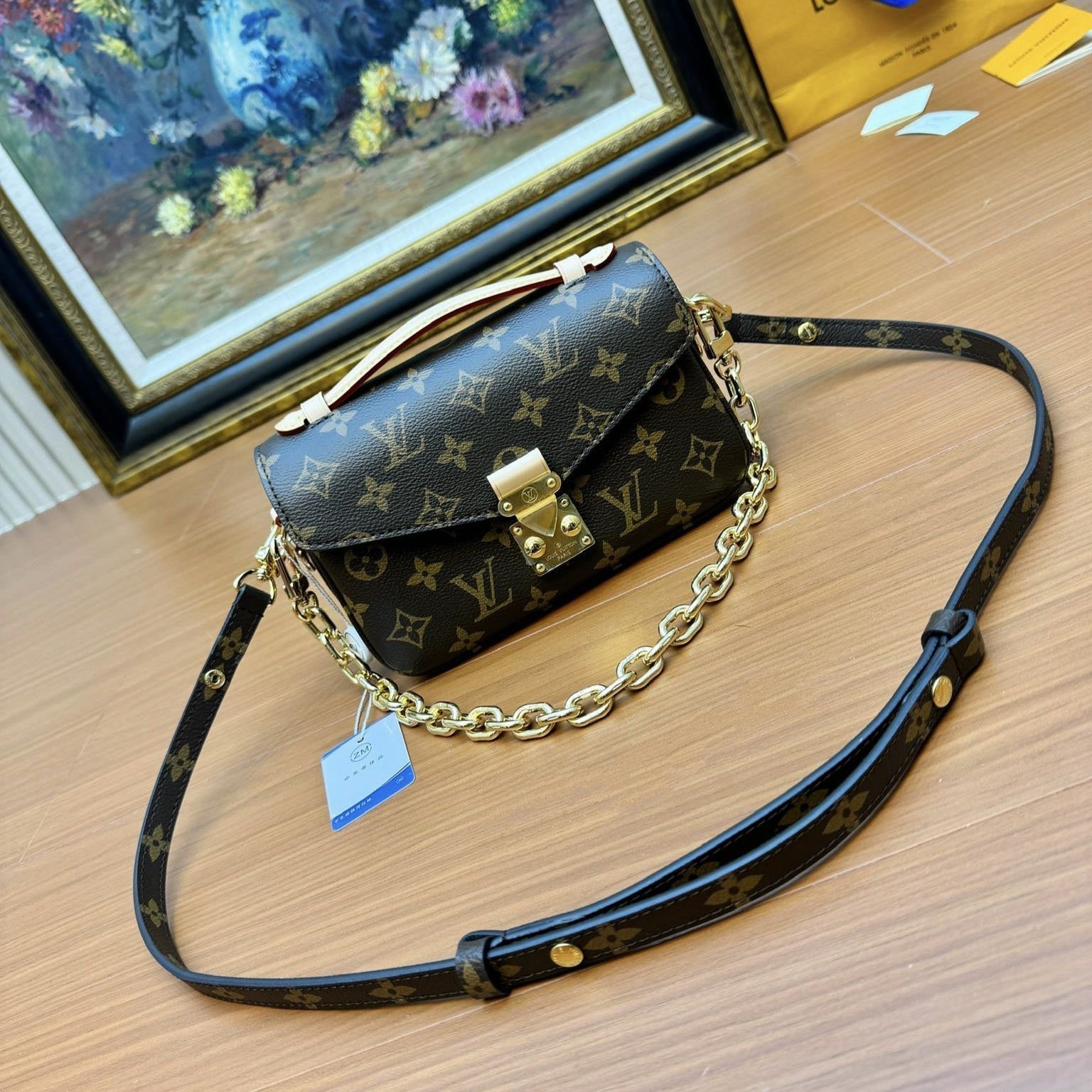 LV POCHETTE METIS EAST WEST MARRON MONOGRAMME TOILE 206021
