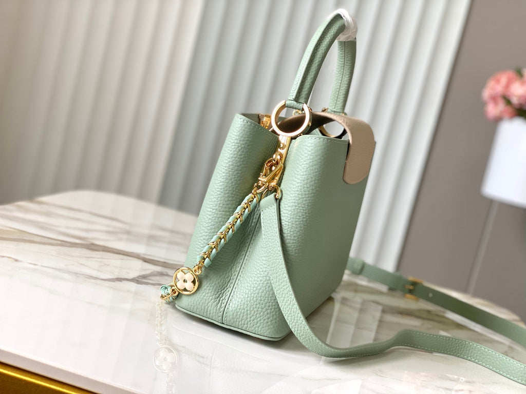 CAPUCINES MM 31.5 GREEN BEIGE TAURILLON LEATHER GOLD HARDWARE