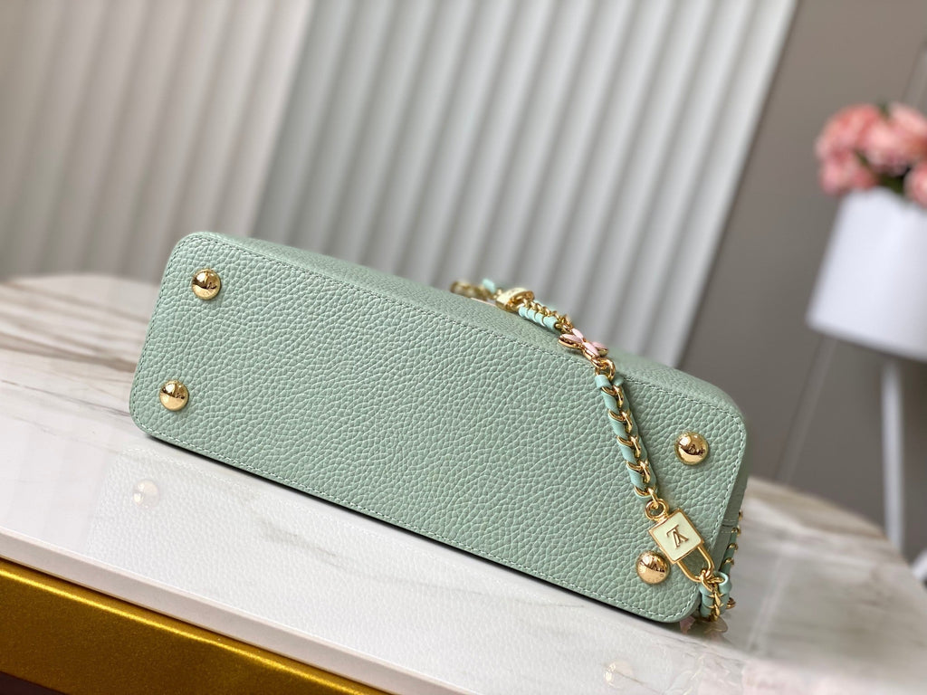 CAPUCINES MM 31.5 GREEN BEIGE TAURILLON LEATHER GOLD HARDWARE