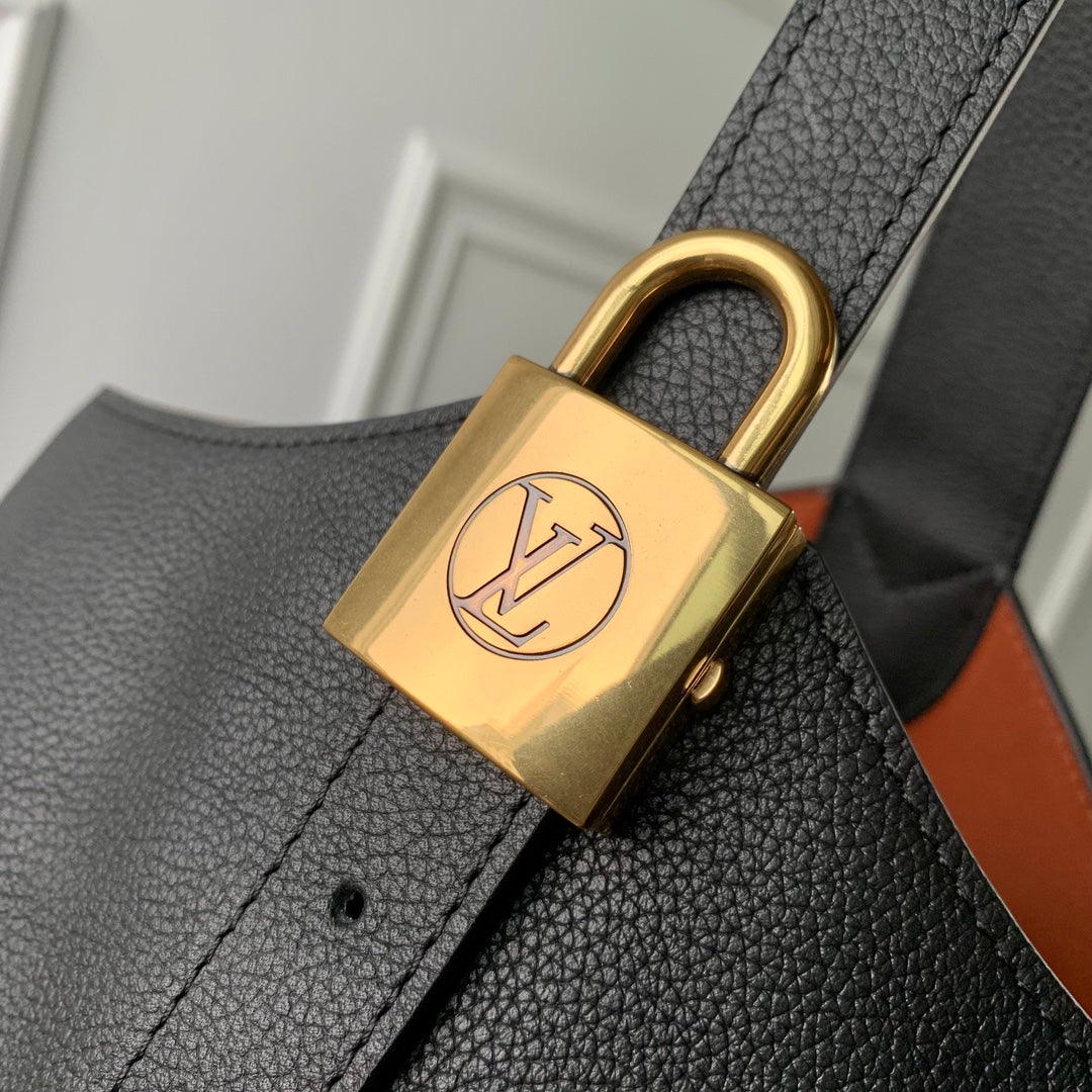 SAC HOBO LOW KEY MM 31CM EN CUIR DE VEAU NOIR