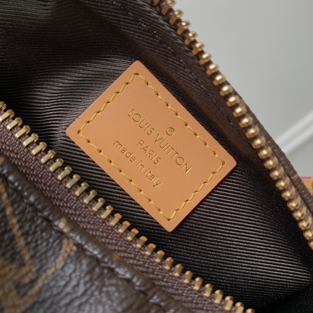SAC POOCH 28 EN TOILE MONOGRAMME MARRON