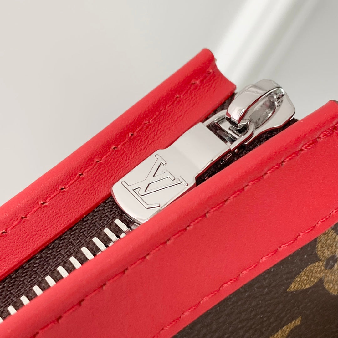Portefeuille portable Gaston 18 pouces en toile monogrammée marron et cuir de veau rouge mélangé