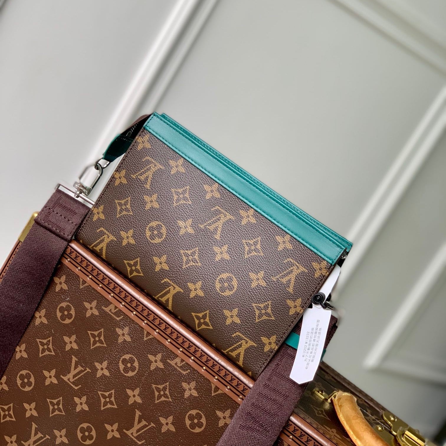 Portefeuille portable Gaston 18 pouces en toile monogrammée marron et cuir de veau vert mélangé