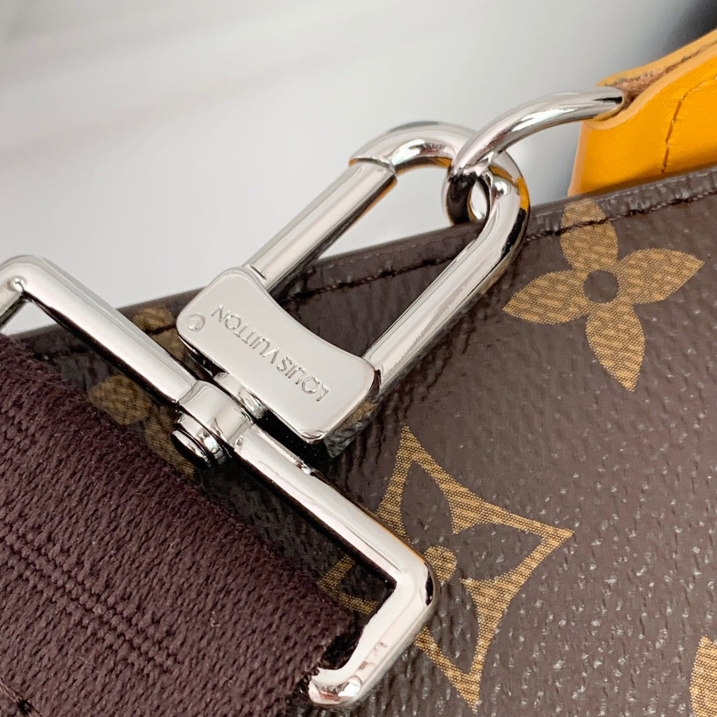 Portefeuille portable Gaston 18 pouces en toile monogrammée marron et cuir de veau jaune mélangé