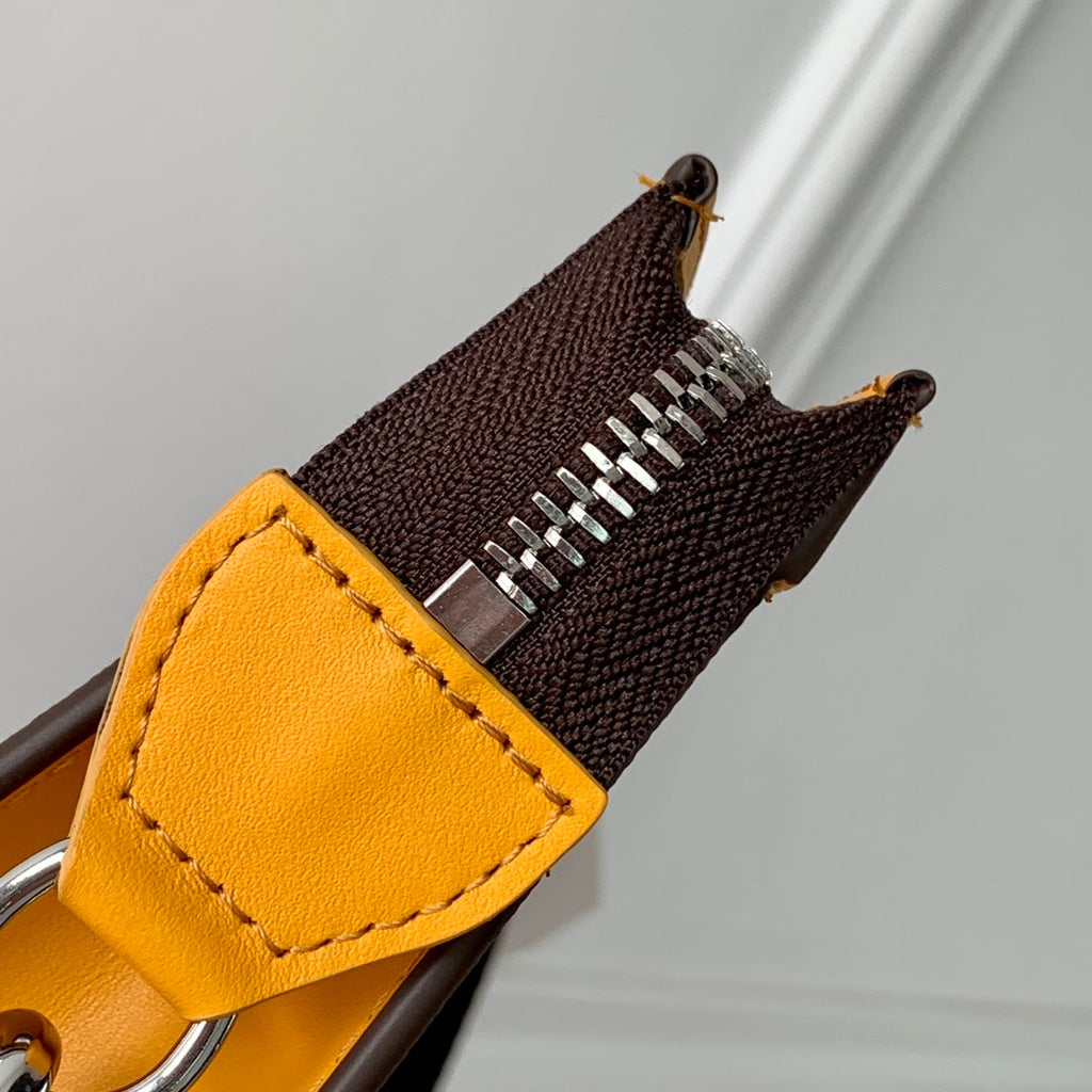 Portefeuille portable Gaston 18 pouces en toile monogrammée marron et cuir de veau jaune mélangé