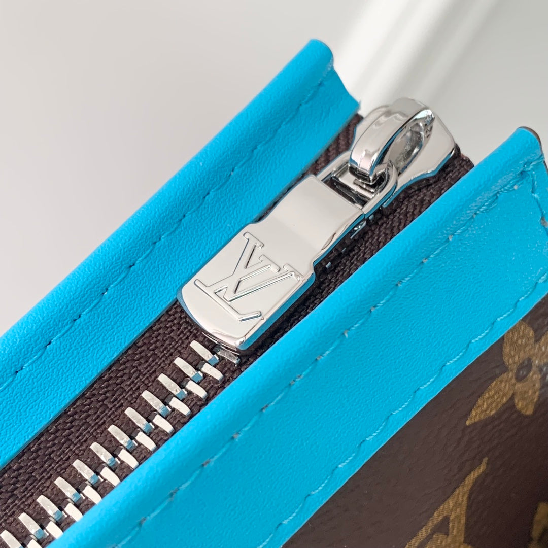 Portefeuille portable Gaston 18 pouces en toile monogrammée marron et cuir de veau ciel mélangé