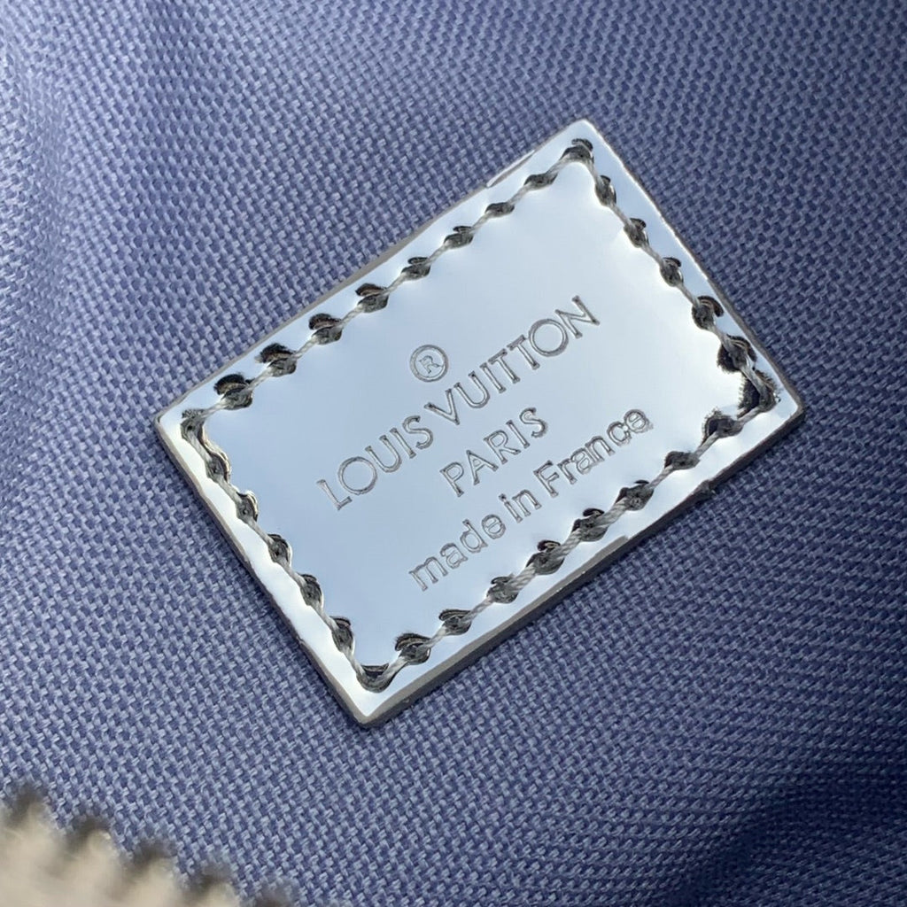 LOOP 23 EN CUIR DE VEAU ESTAMPÉ MONOGRAMME ARGENT