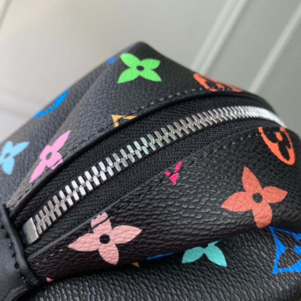TROUSSE À COSMÉTIQUES GM 27 EN TOILE MONOGRAMME COLORÉE