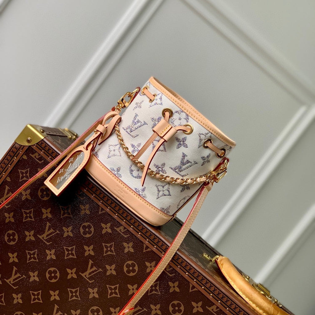 NANO NOE 13X16X10 BEIGE LEATHER WHITE MONOGRAM JACQUARD FABRIC
