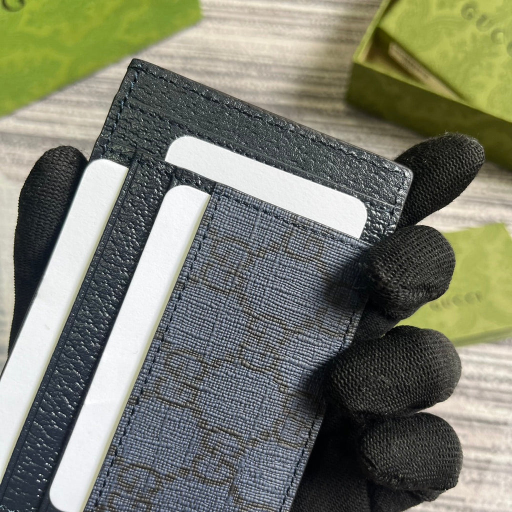 ÉTUI POUR 11 CARTES OPHIDIA GG EN TOILE BLEU FONCÉ ET CUIR DE VEAU NOIR
