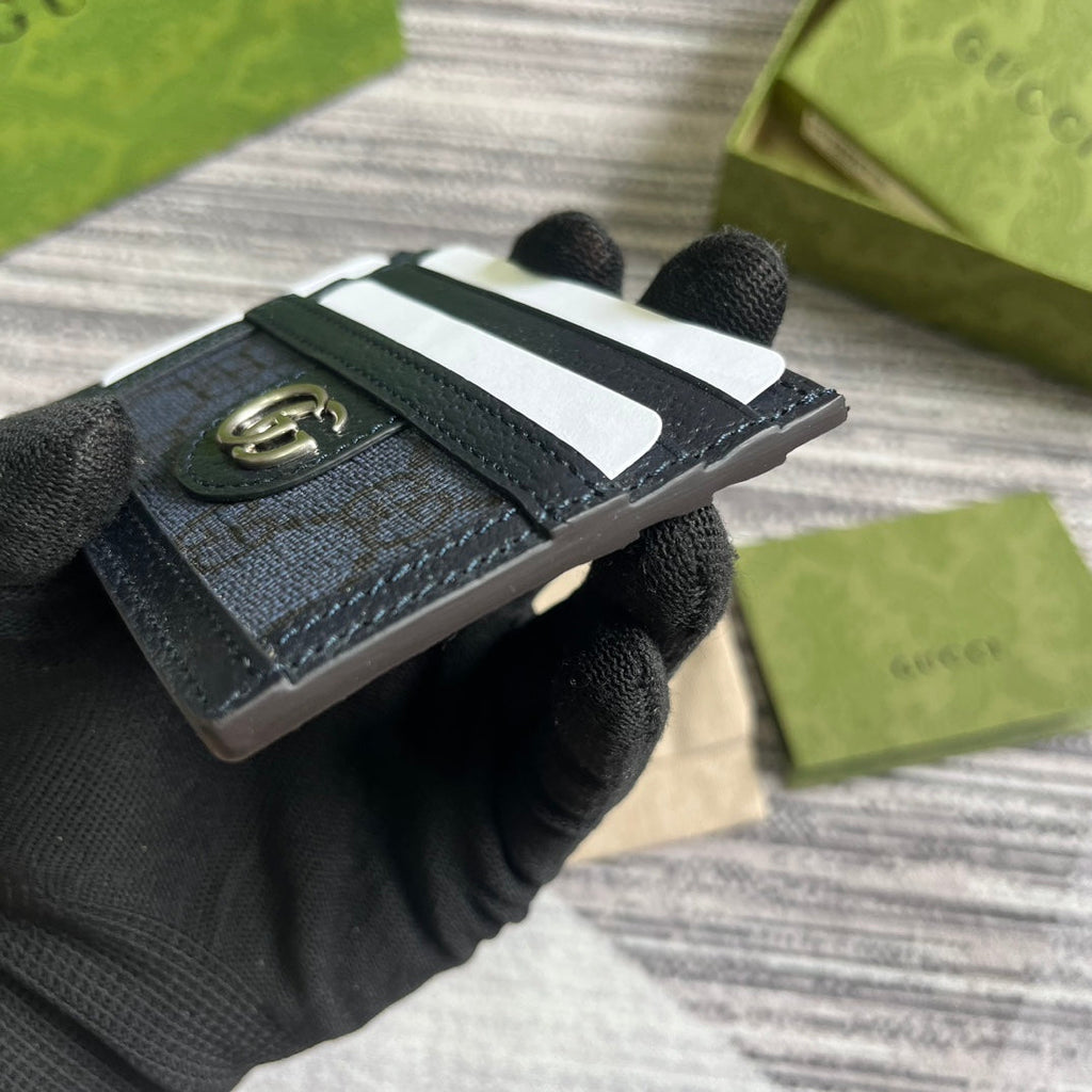 ÉTUI POUR 11 CARTES OPHIDIA GG EN TOILE BLEU FONCÉ ET CUIR DE VEAU NOIR