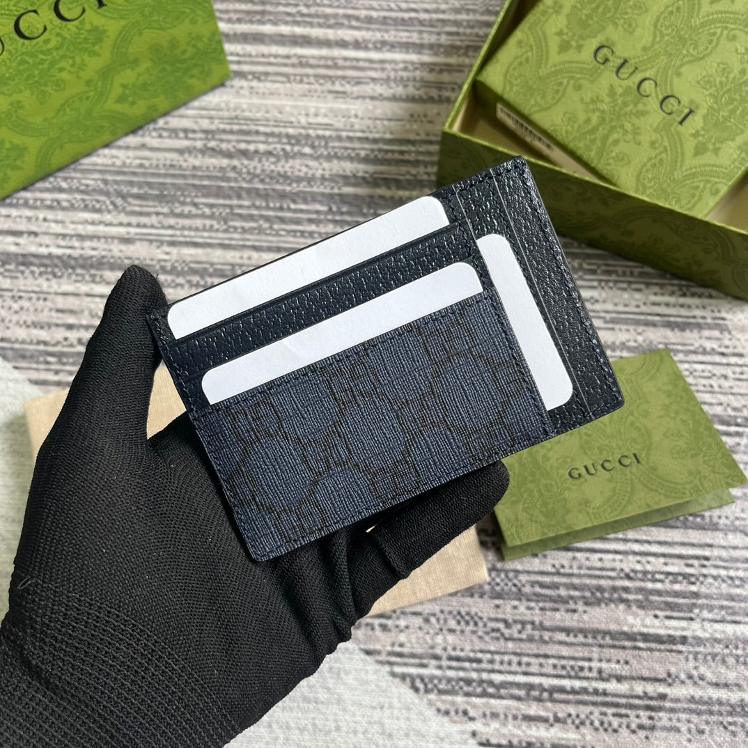 ÉTUI POUR 11 CARTES OPHIDIA GG EN TOILE BLEU FONCÉ ET CUIR DE VEAU NOIR