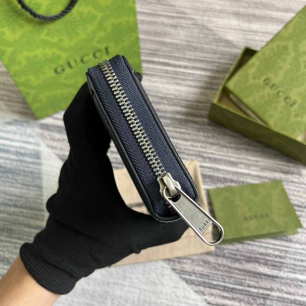 PORTEFEUILLE ZIPPÉ OPHIDIA GG 19 EN TOILE BLEU FONCÉ ET CUIR DE VEAU NOIR