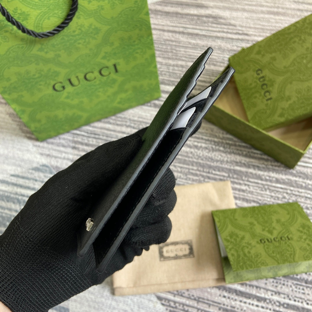 PORTE-CARTES LONG 12 EN CUIR DE VEAU NOIR