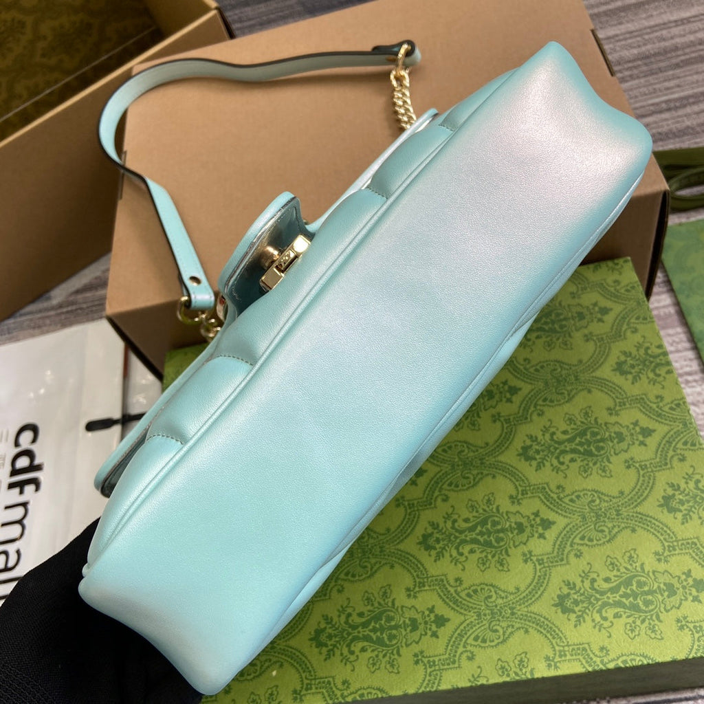 SAC À BANDOULIÈRE MOYEN GG MARMONT 26 EN CUIR DE VEAU IRISÉ BLEU