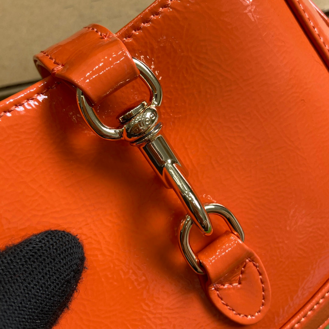 ジャッキー・ノッテ ミニバッグ 19インチ オレンジ クラックラッカーカーフスキン ゴールド金具