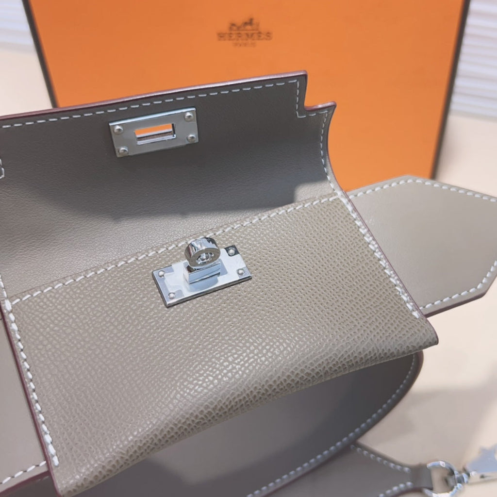 KELLY POCKET 50MM GRIS EPSOM QUINCAILLERIE ARGENTÉE BANDOULIÈRE 