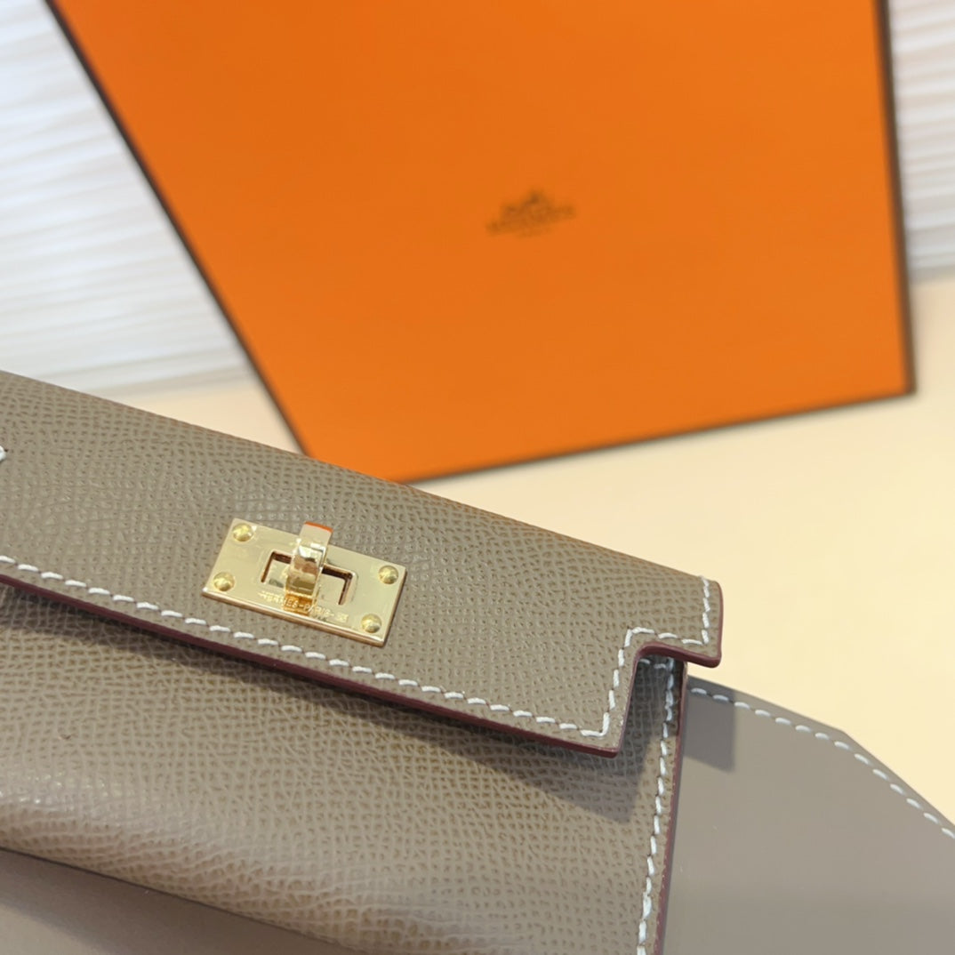KELLY POCKET 50MM EPSOM GRIS BANDOULIÈRE EN ACIER DORÉ 