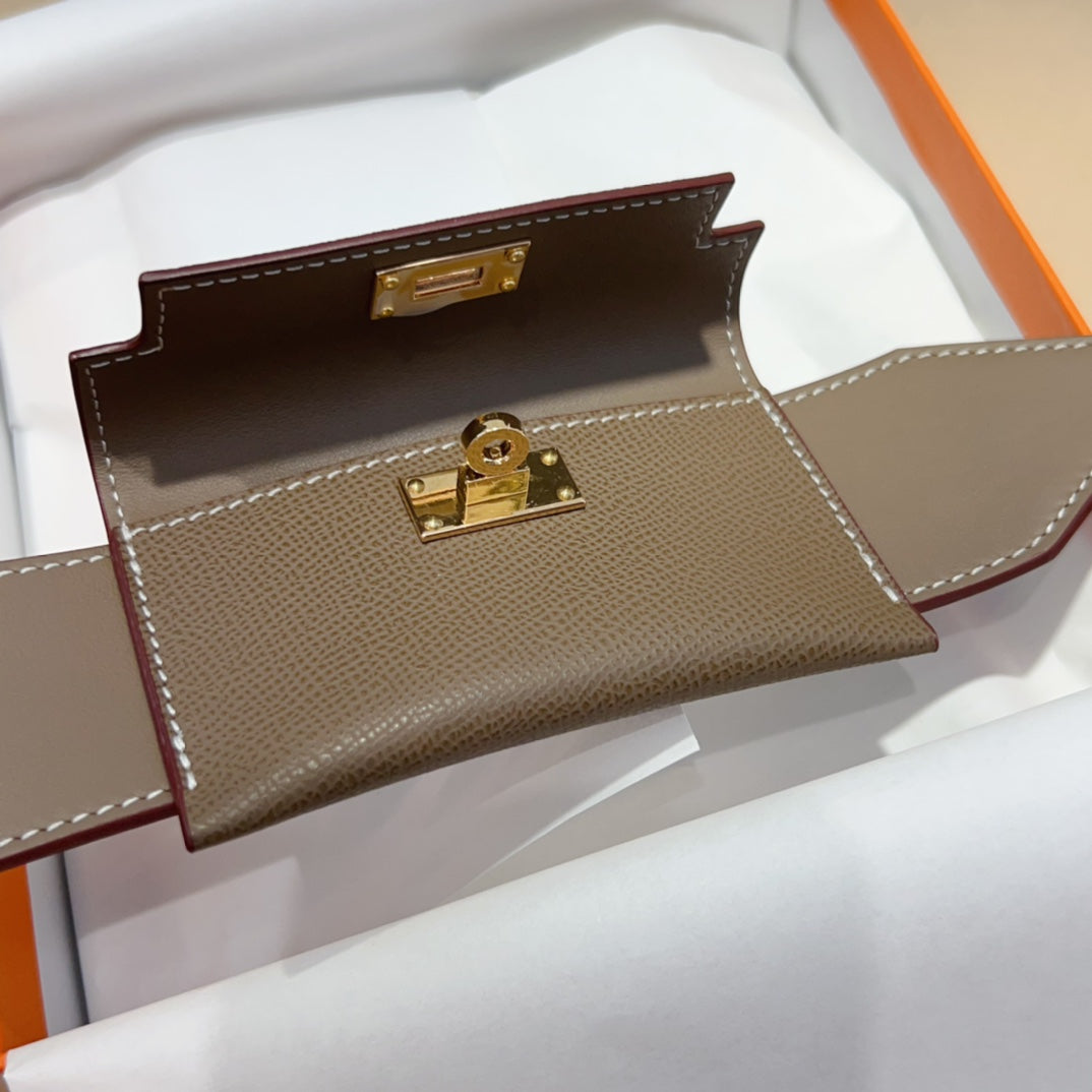 KELLY POCKET 50MM EPSOM GRIS BANDOULIÈRE EN ACIER DORÉ 