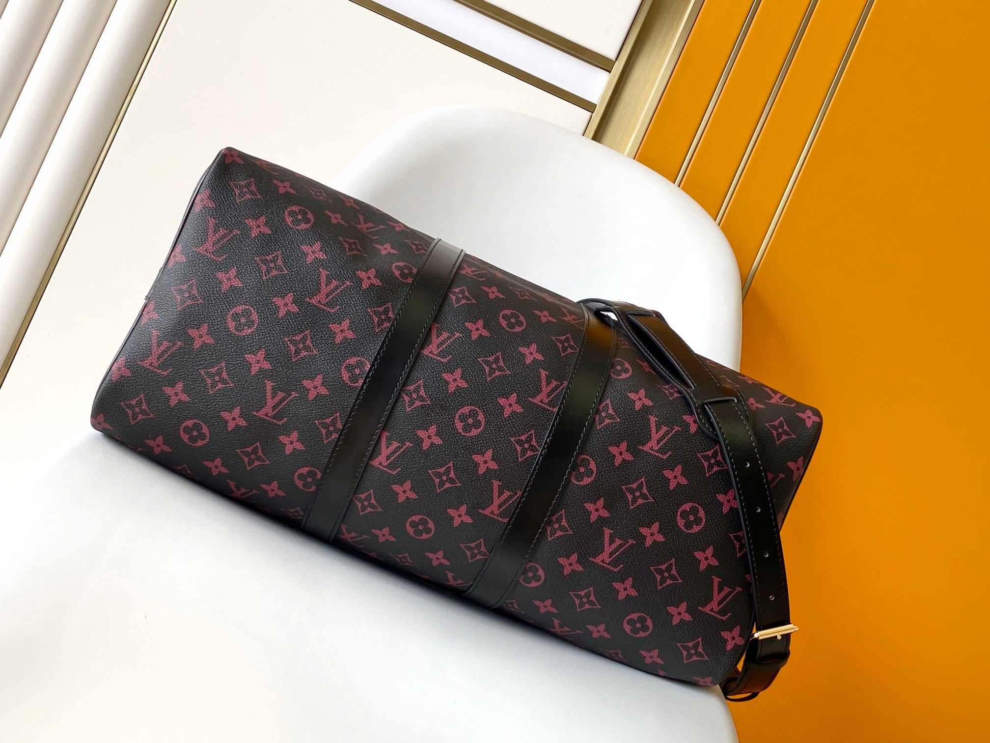 KEEPALL BANDOULIÈRE 45 EN TOILE TOMETTE MONOGRAMME NOIRE