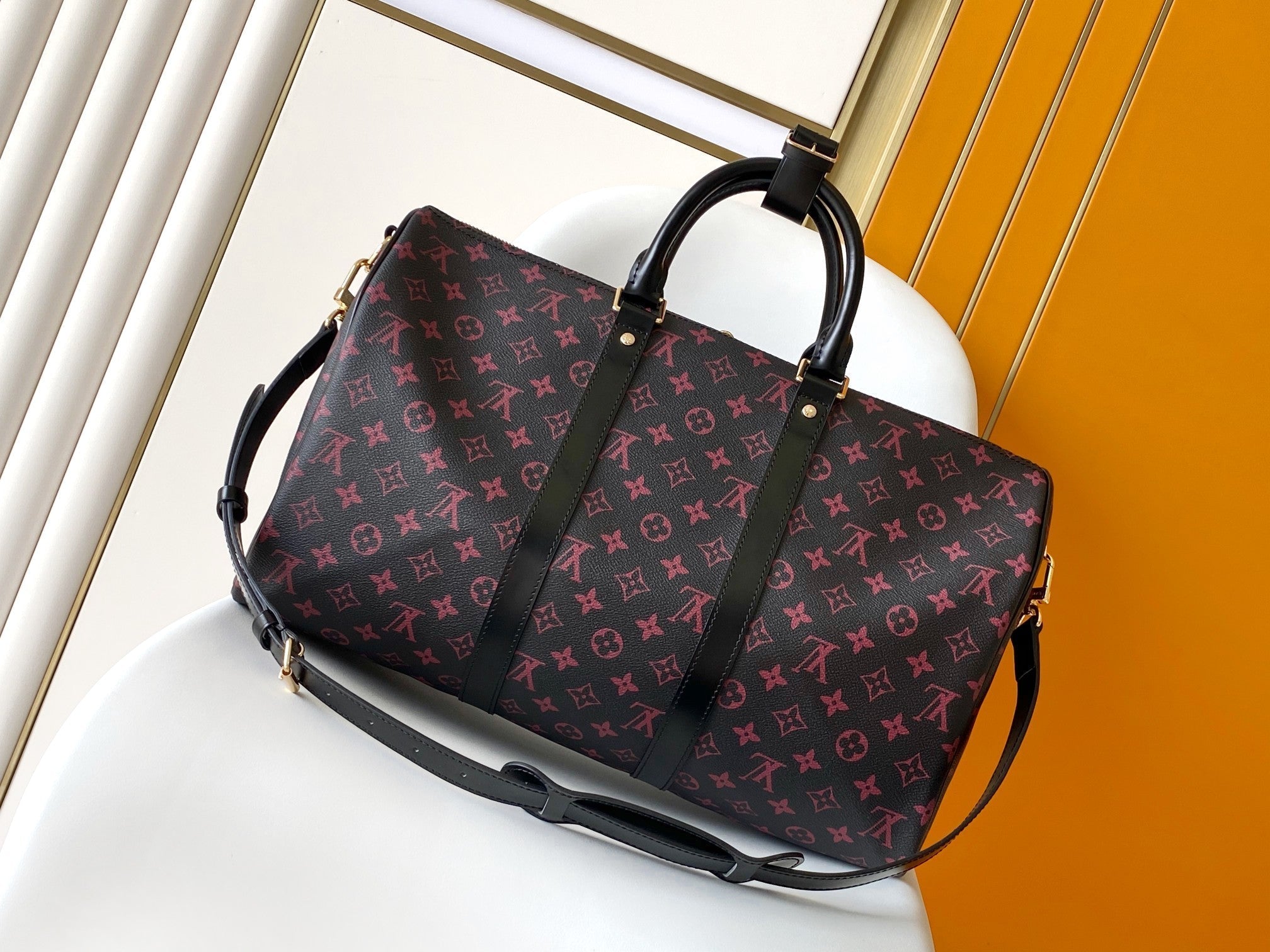 KEEPALL BANDOULIÈRE 45 EN TOILE TOMETTE MONOGRAMME NOIRE