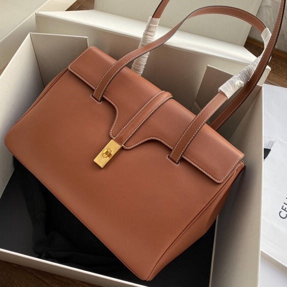 SAC SOUPLE 32 CUIR DE VEAU LISSE TAN