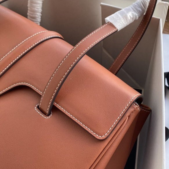 SAC SOUPLE 32 CUIR DE VEAU LISSE TAN