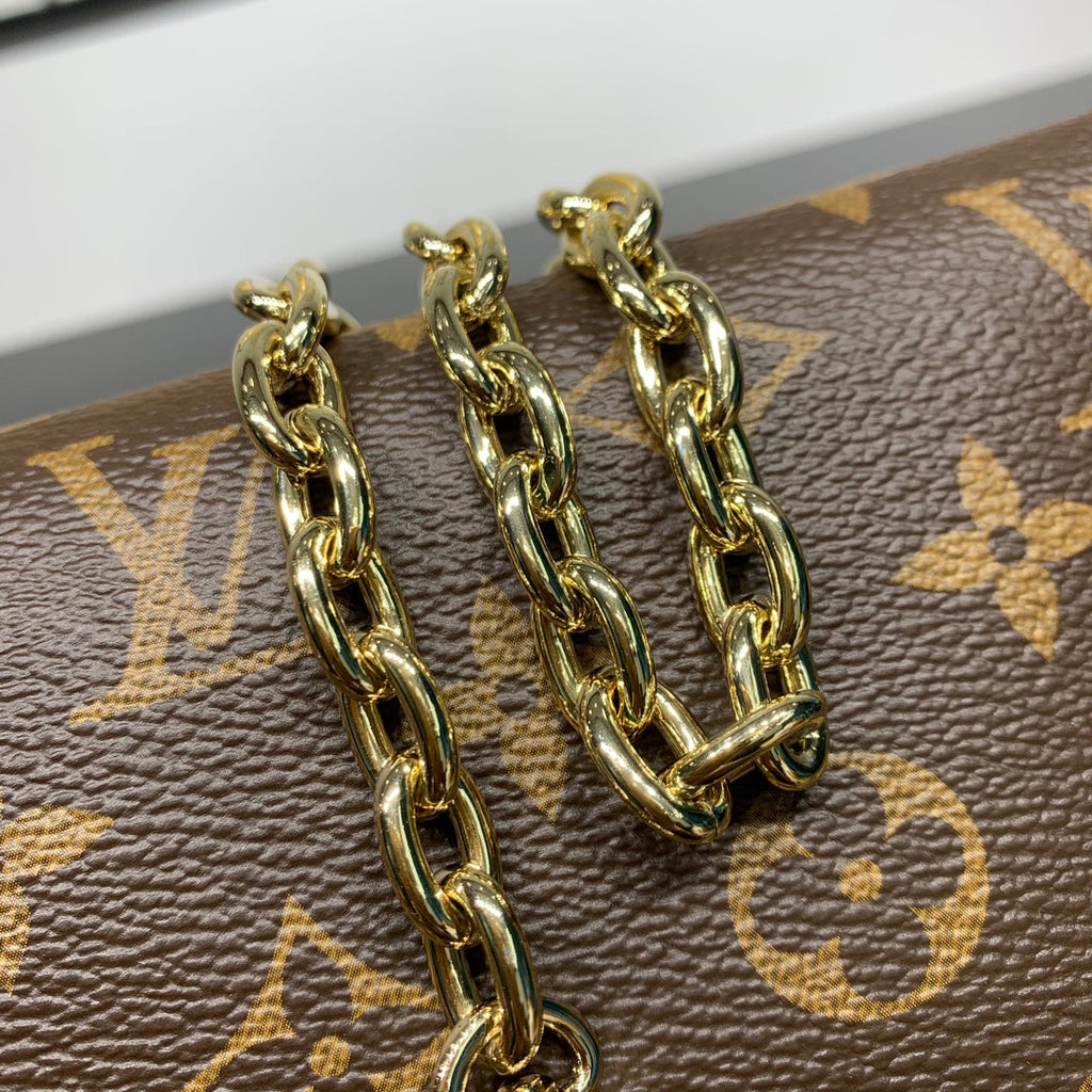 Pochette Bloom 22 en toile monogrammée marron et côtés en cuir de veau jaune pastel