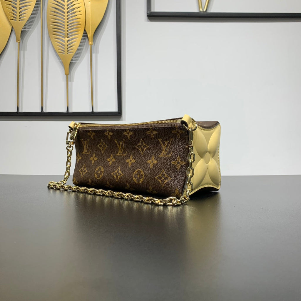 Pochette Bloom 22 en toile monogrammée marron et côtés en cuir de veau jaune pastel
