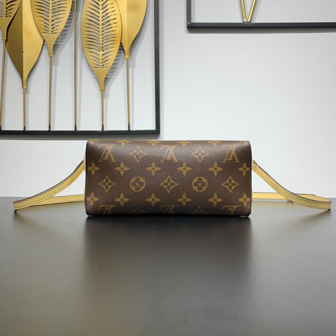 Pochette Bloom 22 en toile monogrammée marron et côtés en cuir de veau jaune pastel