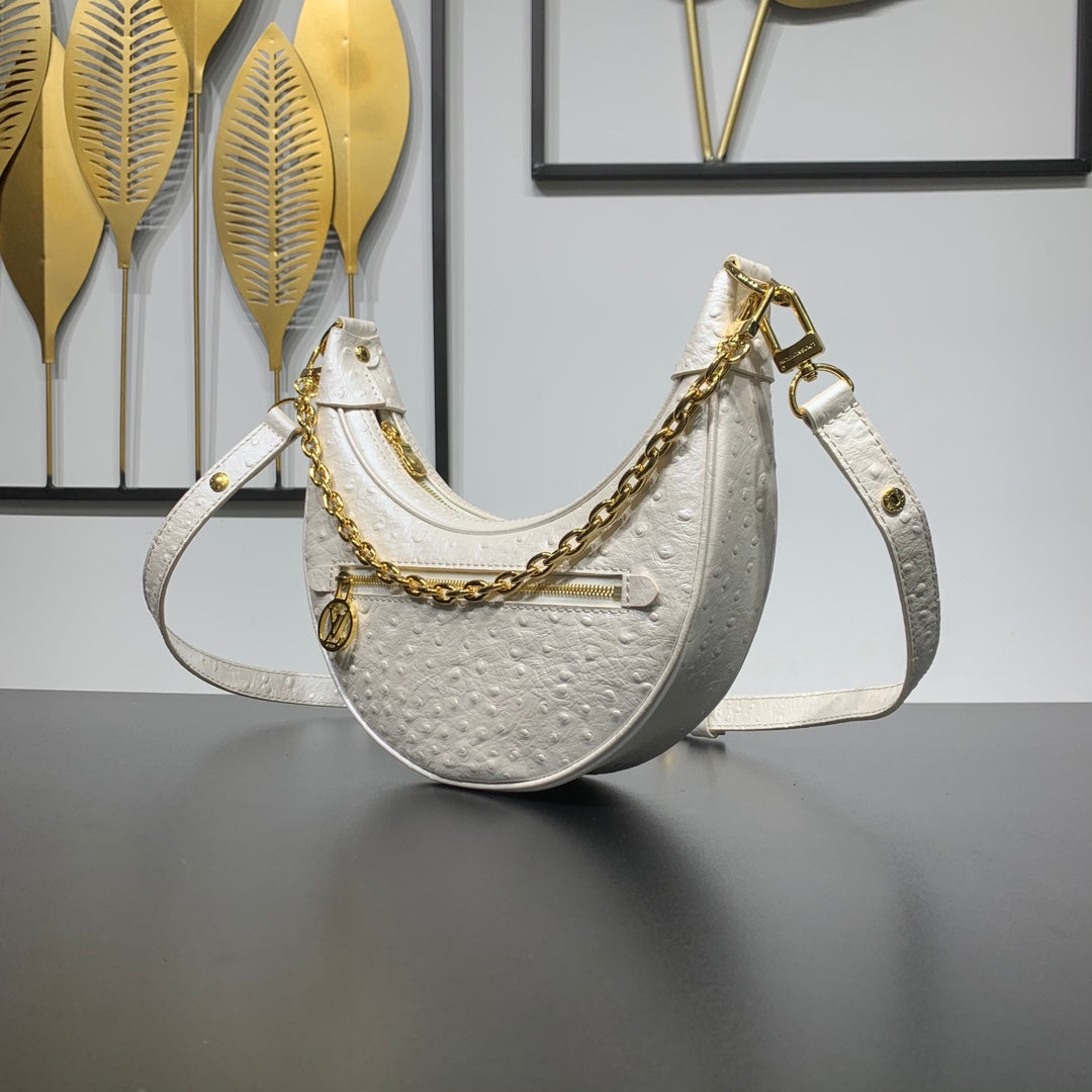 LOOP 23 EN CUIR D'AUTRUCHE BLANC PERLÉ QUINCAILLERIE DORÉ