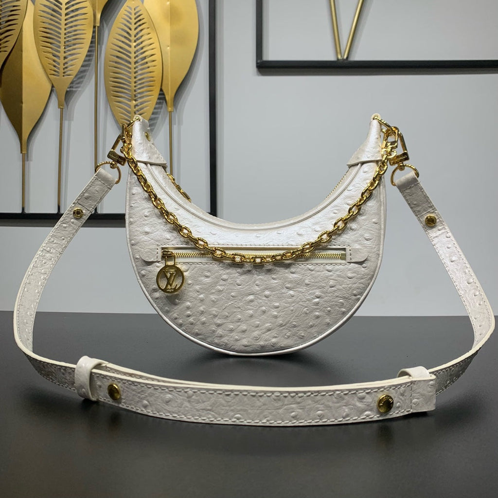 LOOP 23 EN CUIR D'AUTRUCHE BLANC PERLÉ QUINCAILLERIE DORÉ