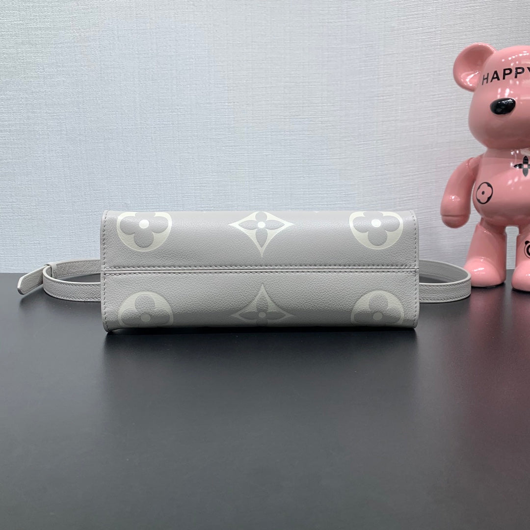 LV ONTHEGO EAST WEST CUIR EMPREINTE MONOGRAMME GRIS 205497