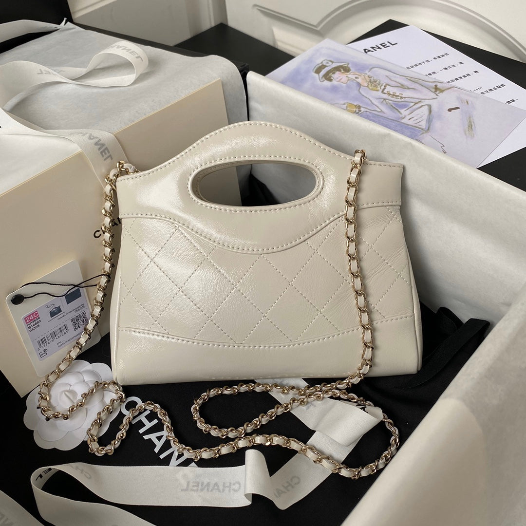 CC 24S31 NANO SHOPPING BAG 17.5CM CREAM LAMBSKIN GOLD HARDWARE
