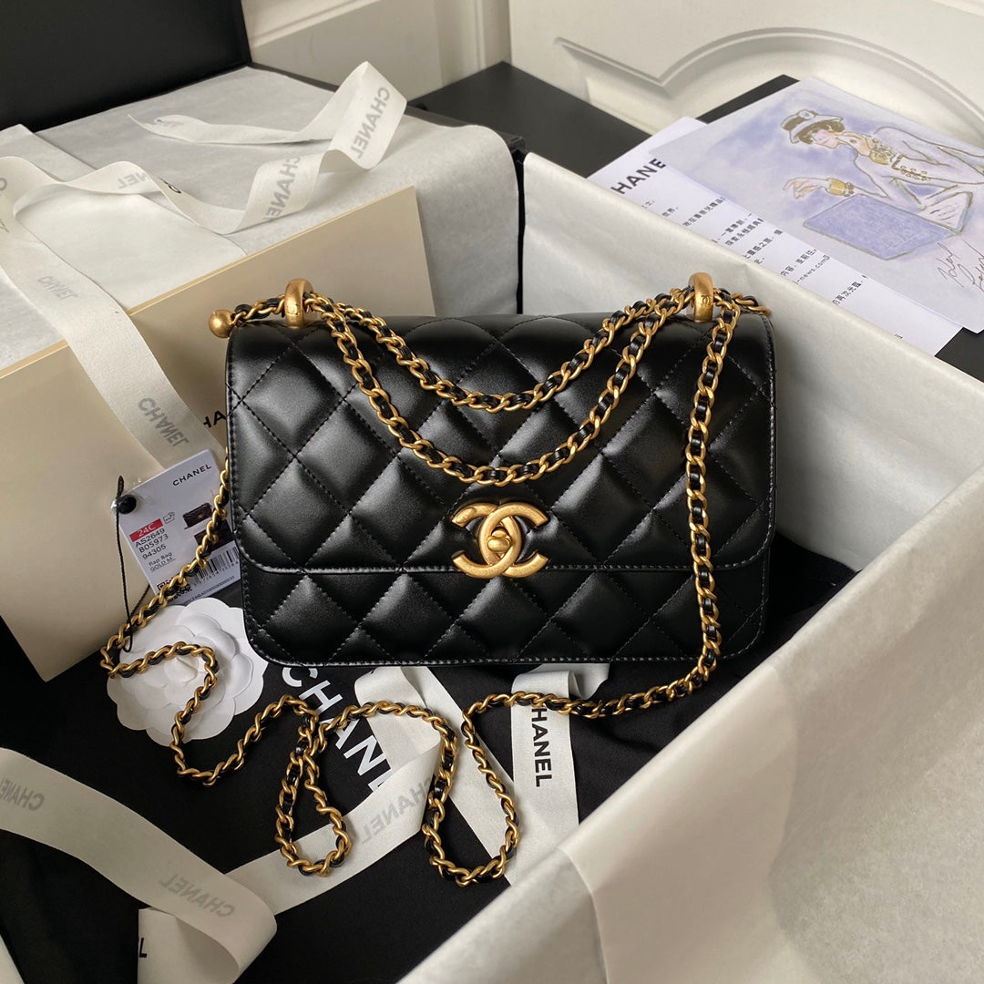SAC À RABAT 22 EN CUIR DE VEAU NOIR AVEC DOUBLE BOULE DORÉ