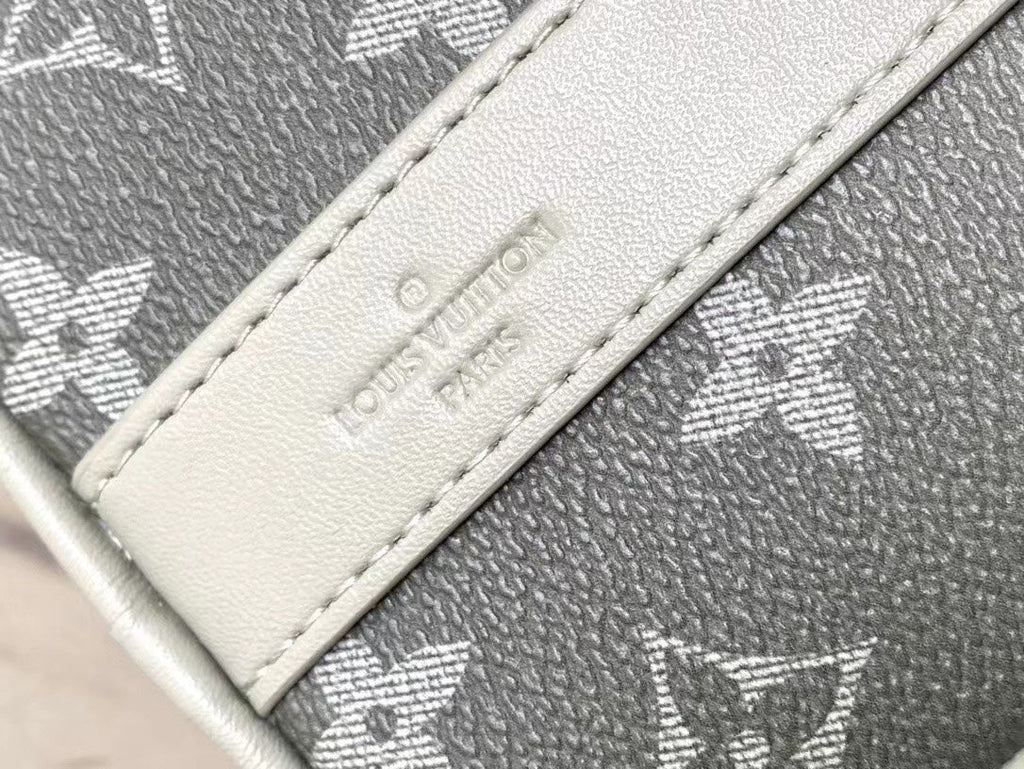 KEEPALL BANDOULIÈRE 25 EN TOILE GRIS MONOGRAMME DÉGRADÉ